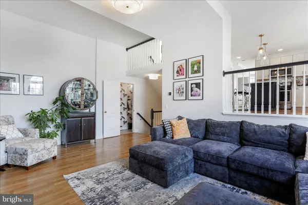 a bedroom with a bed and a television