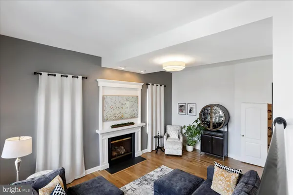 a bedroom with a bed and a television