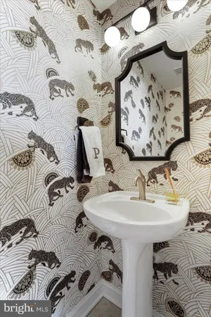 a bathroom with a sink double vanity and a mirror