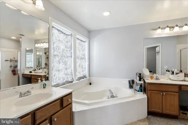 a bedroom with a bed and cabinets