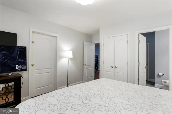 a view of backyard with seating area and trees around