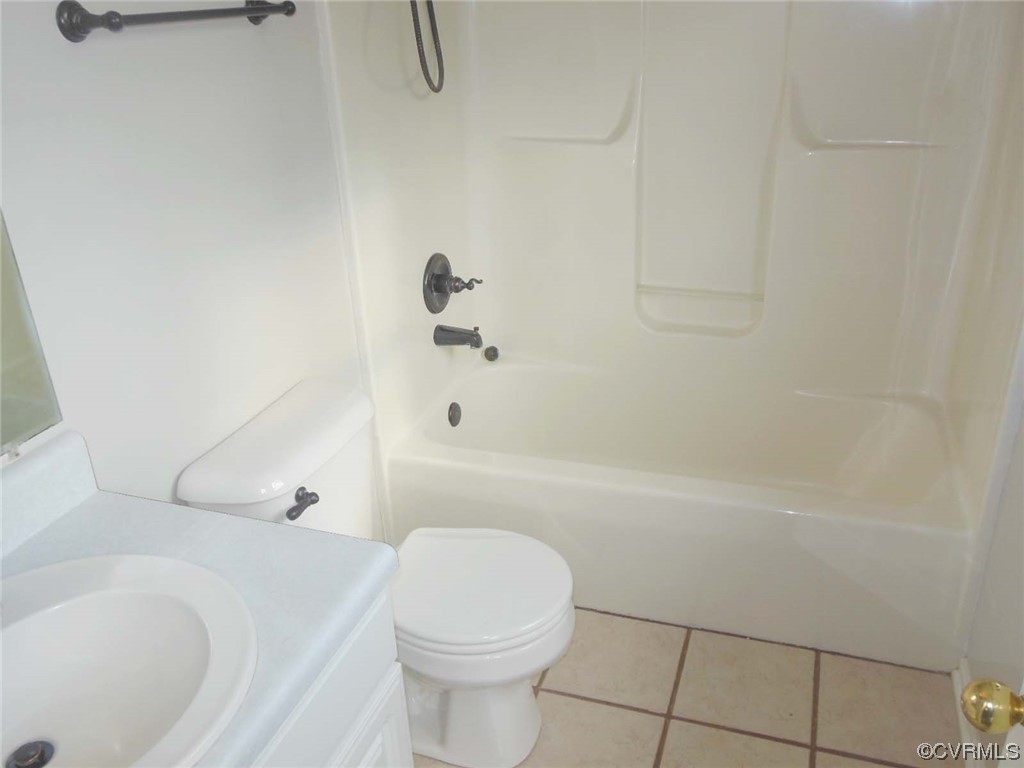 7447 Trailing Rock Road Prince George, VA 23875 - Photo 21 of 28 a bathroom with a sink a toilet and a bathtub