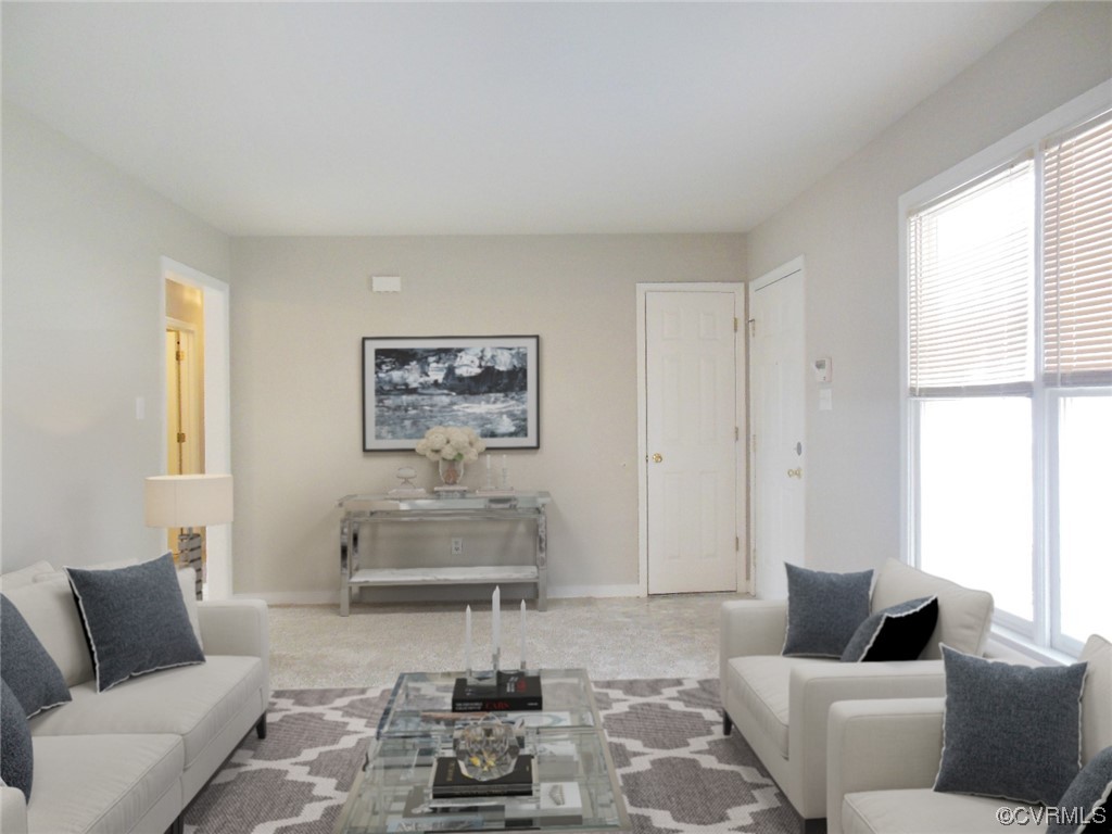 7447 Trailing Rock Road Prince George, VA 23875 - Photo 6 of 28 a living room with furniture and a couch