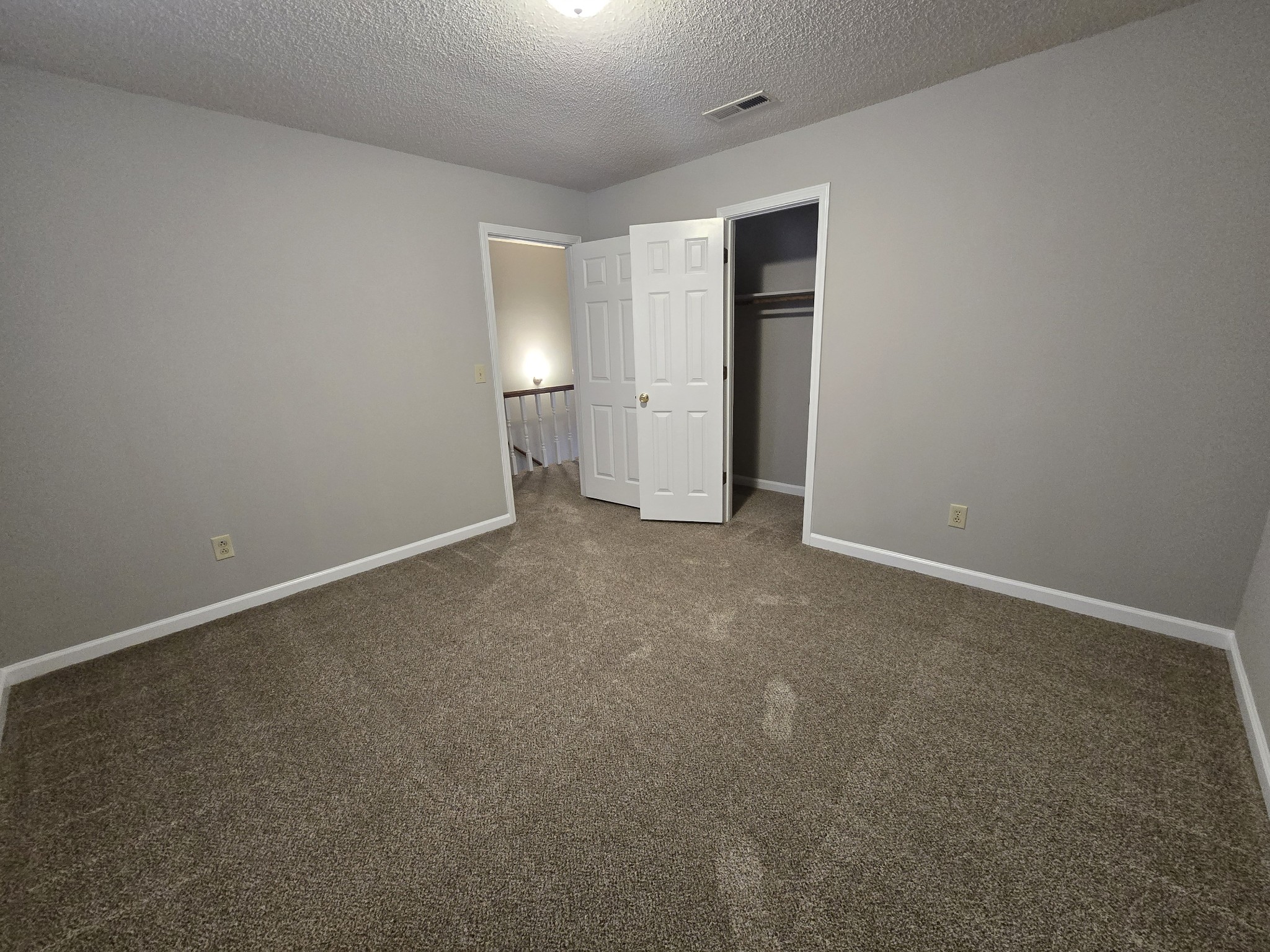 224 Hunter Drive Columbia, TN 38401 - Photo 11 of 13 a view of an empty room with closet and wooden floor