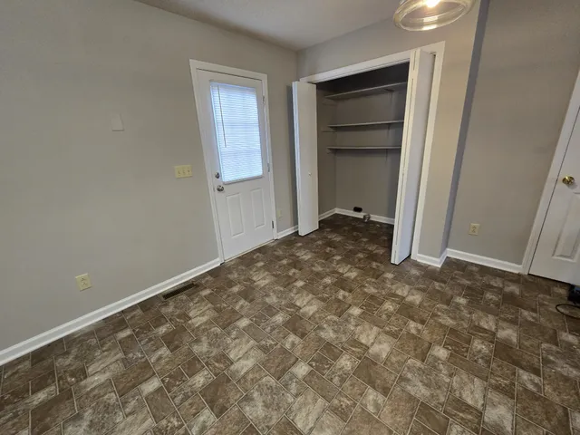 a bathroom with a sink a toilet and vanity