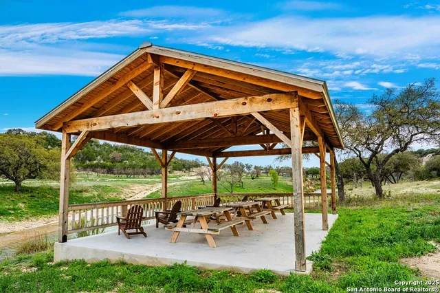 a view of a town with large trees