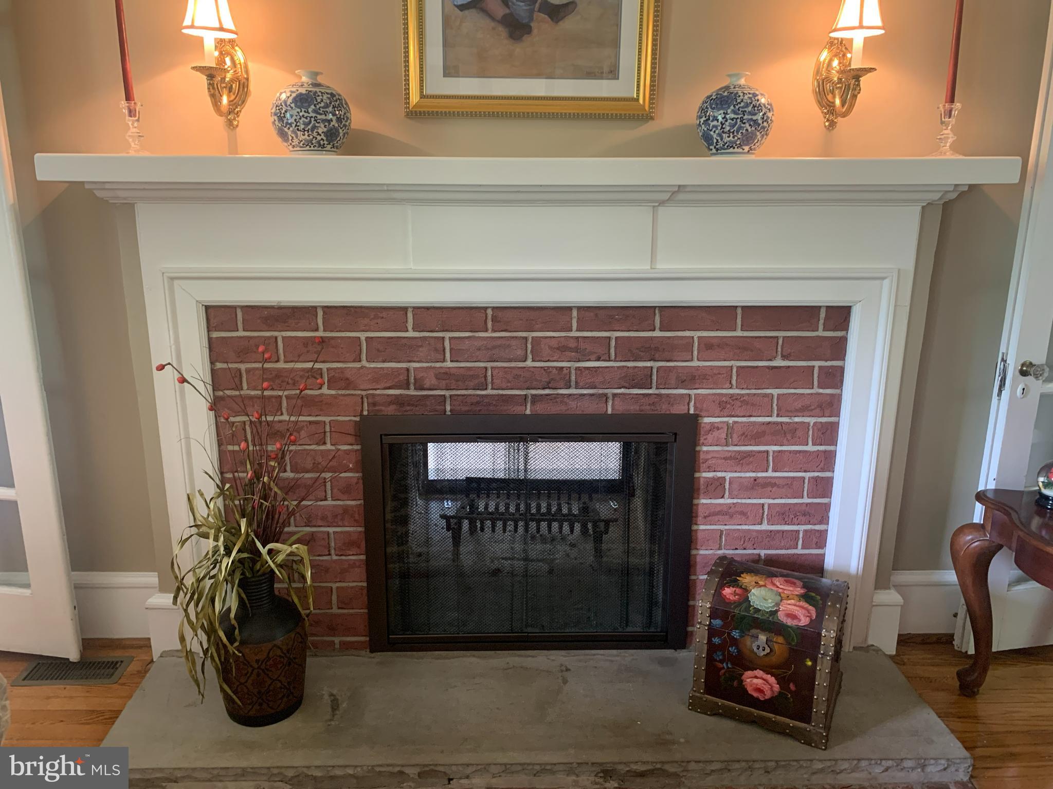 65 South Rolling Road Springfield, PA 19064 - Photo 20 of 70 Brick face of fireplace in Living Room