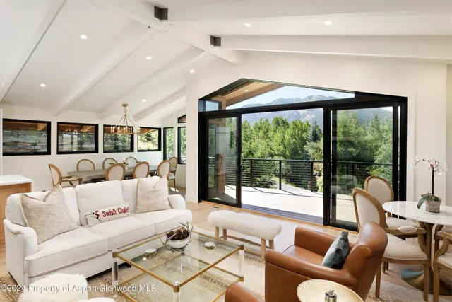 a bedroom with a bed and a night stand