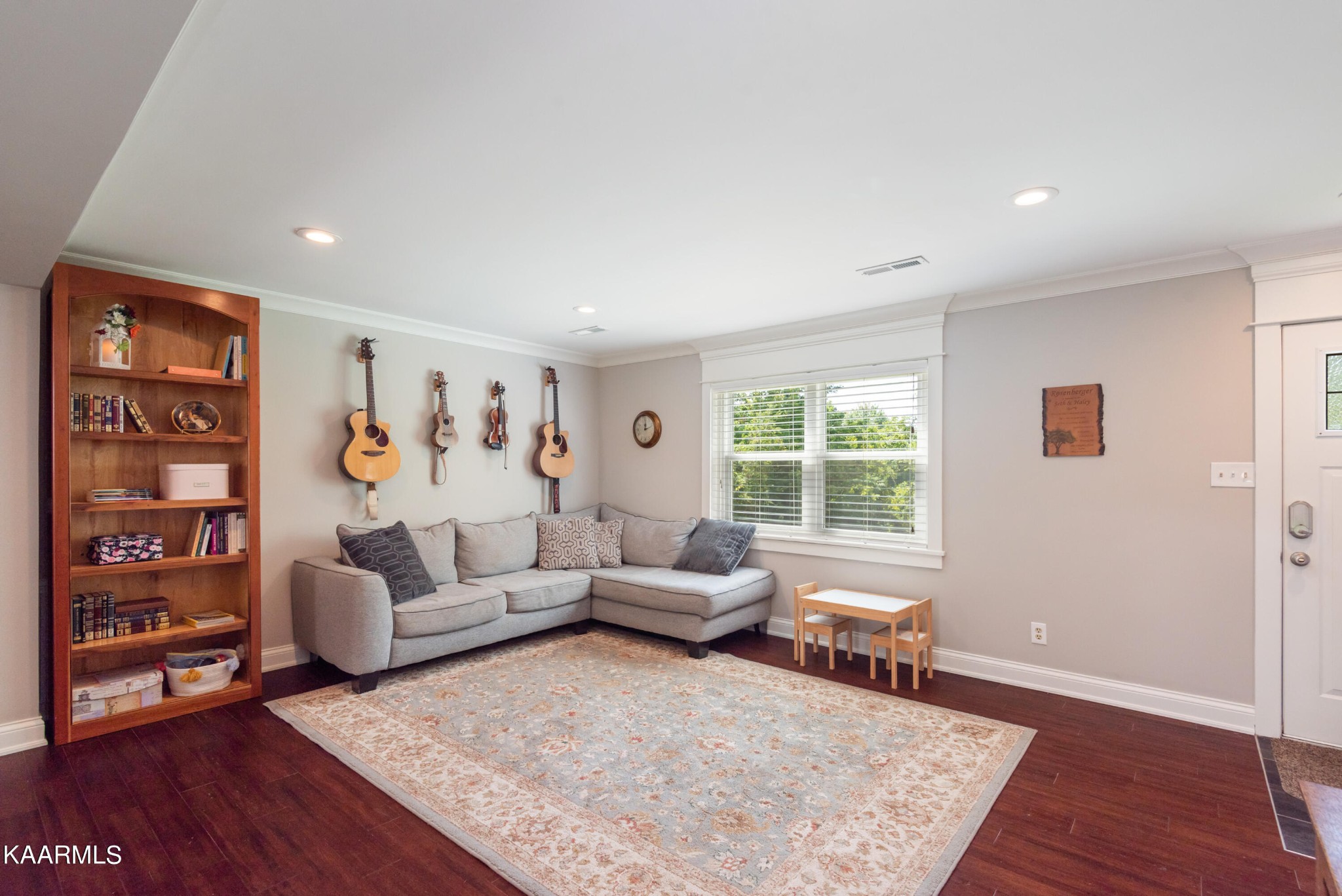 6034 Pleasant Ridge Road Knoxville, TN 37912 - Photo 3 of 40 a living room with furniture and wooden floor