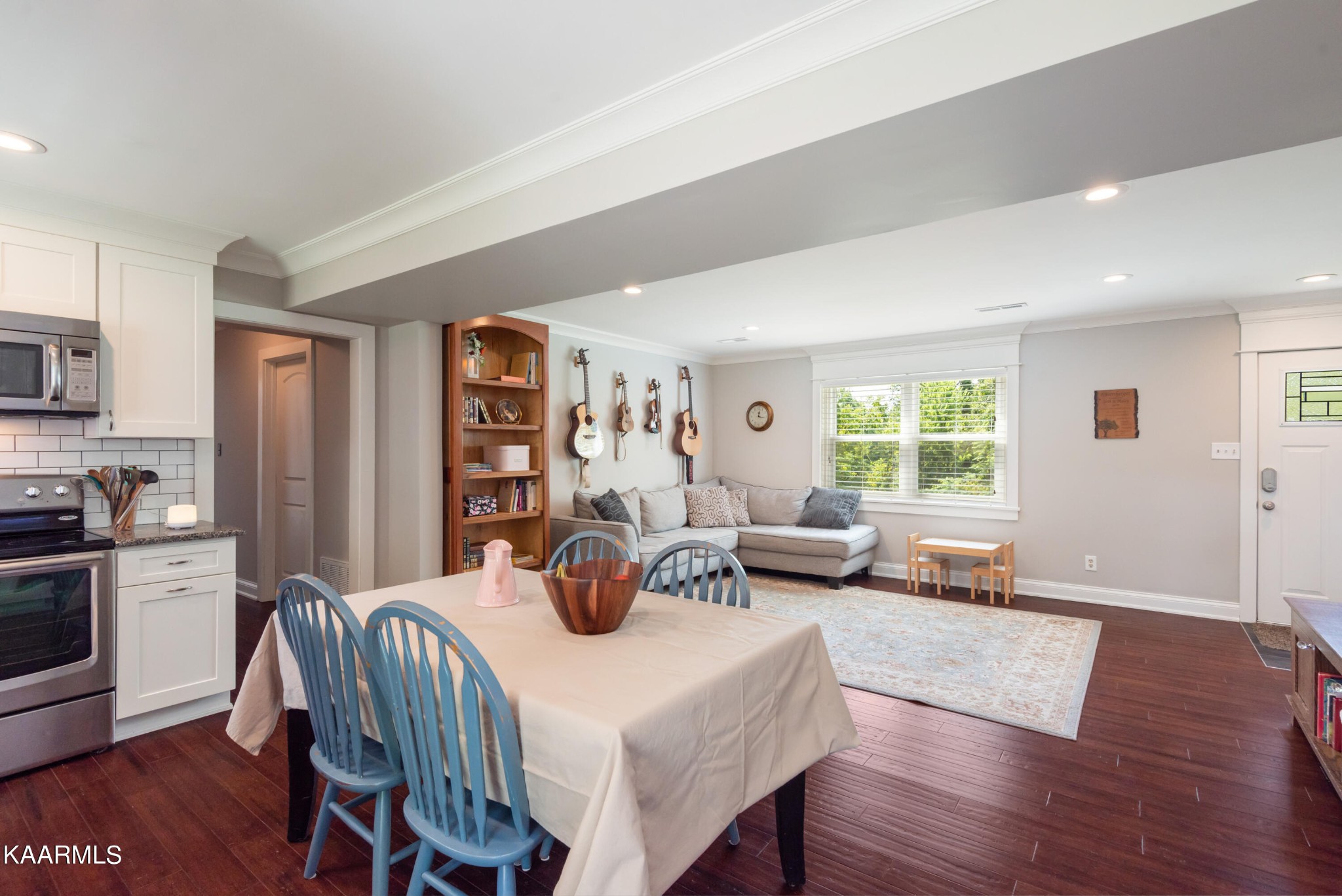 6034 Pleasant Ridge Road Knoxville, TN 37912 - Photo 9 of 40 a view of a dining room with furniture and wooden floor