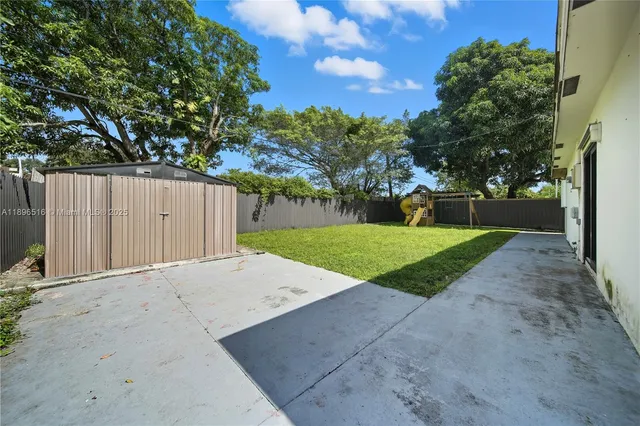 a view of a garden with a slide