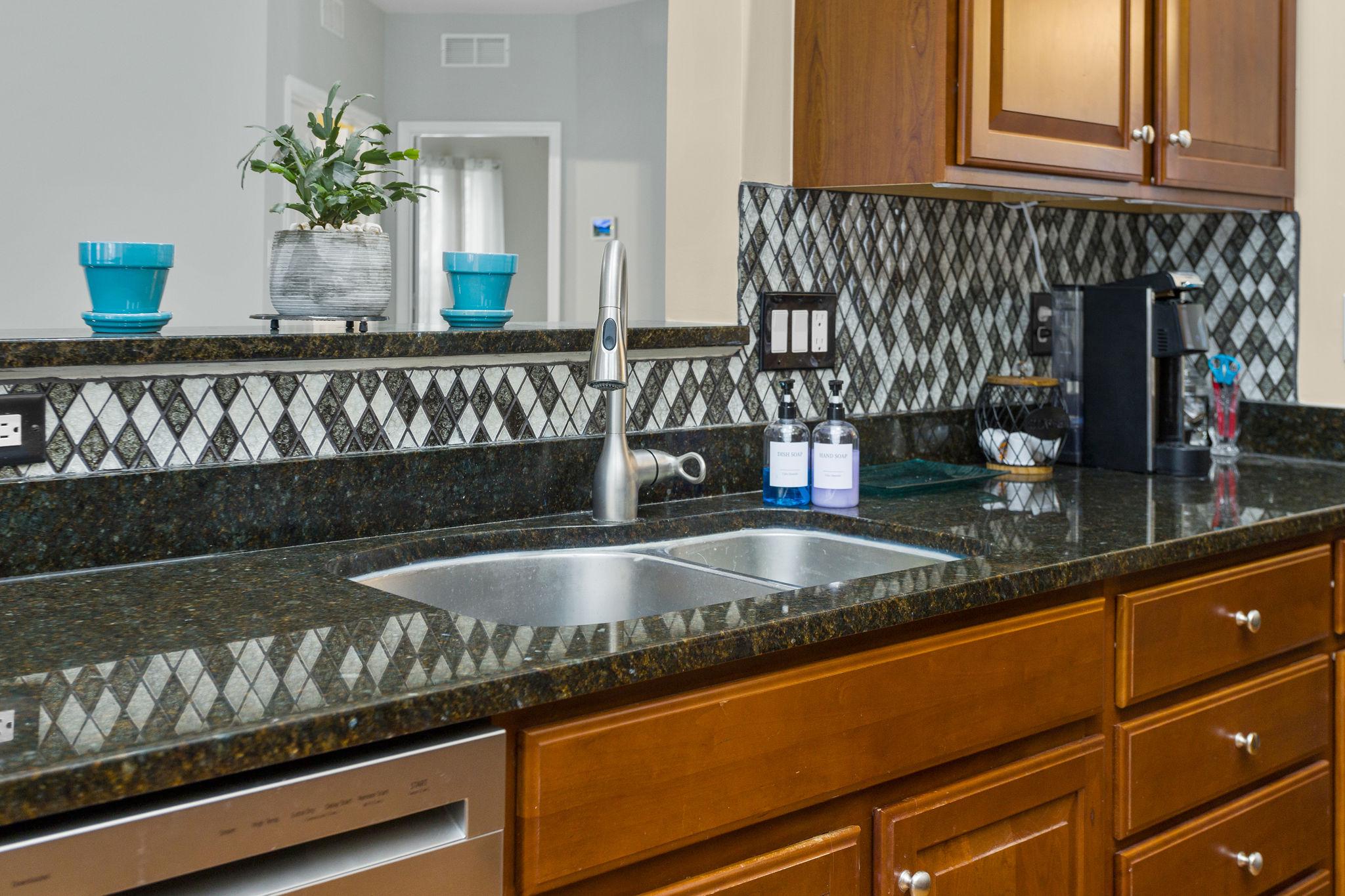 5 Tommys Meadow Pemberton, NJ 08068 - Photo 14 of 29 Sleek kitchen with glass tile backsplash
