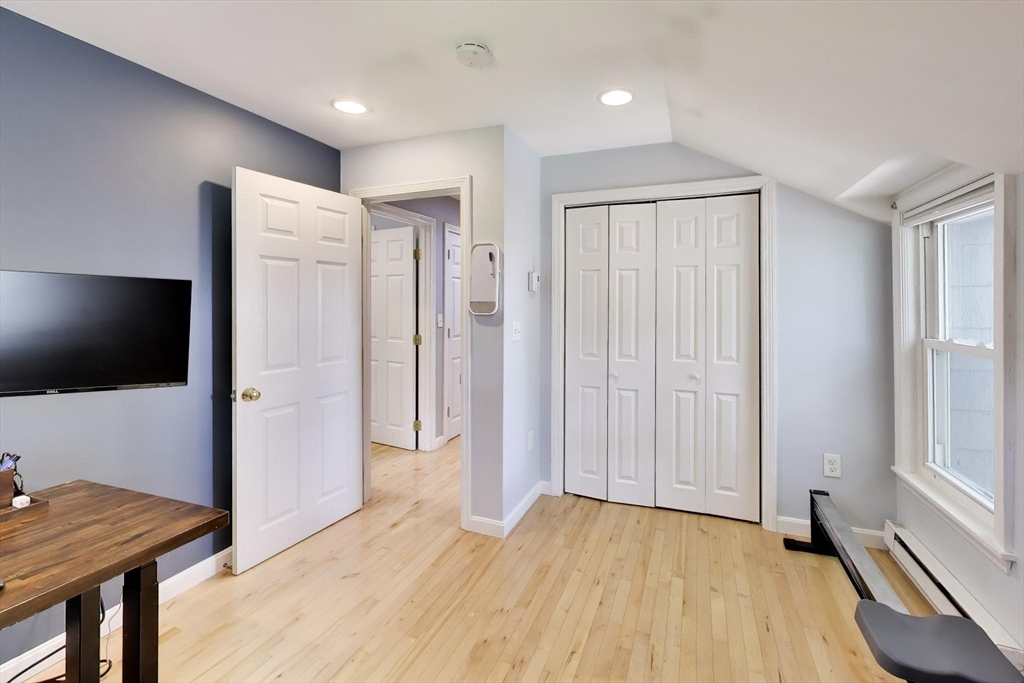 22 Douglas Road Ashland, MA 01721 - Photo 16 of 24 a view of room with furniture and wooden floor
