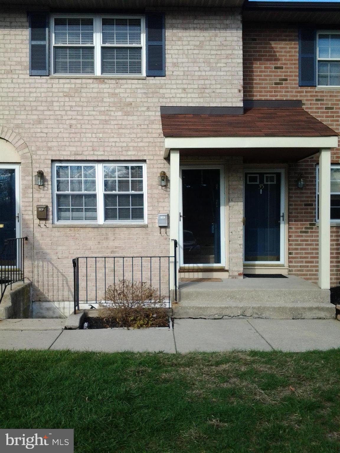 37 Eaves Mill Road Medford, NJ 08055 - Photo 2 of 14 a front view of a house with a garden