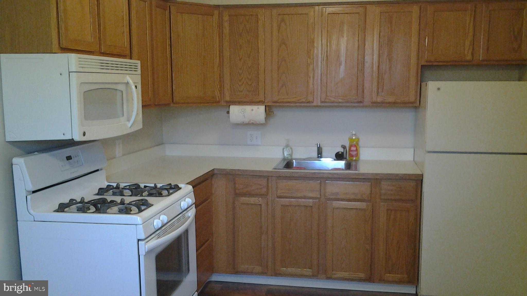 37 Eaves Mill Road Medford, NJ 08055 - Photo 3 of 14 a kitchen with stainless steel appliances granite countertop a stove a refrigerator and a cabinets