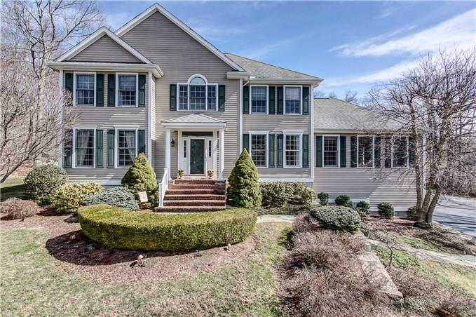 42 Gatehouse Road Trumbull, CT 06611 - Photo 1 of 1 a front view of a house with a yard