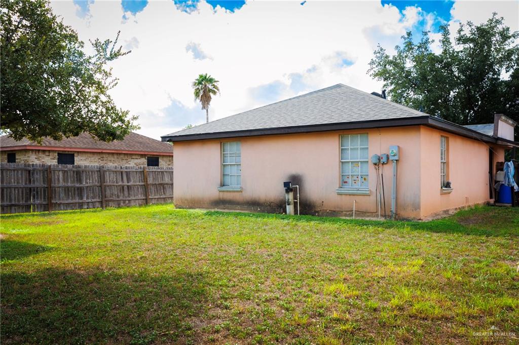 808 West Starr Avenue Pharr, TX 78577 - Photo 16 of 18 Rear view of property with stucco siding and roof with shingles