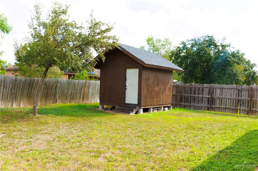 808 West Starr Avenue Pharr, TX 78577 - Photo 18 of 18 View of shed featuring a fenced backyard