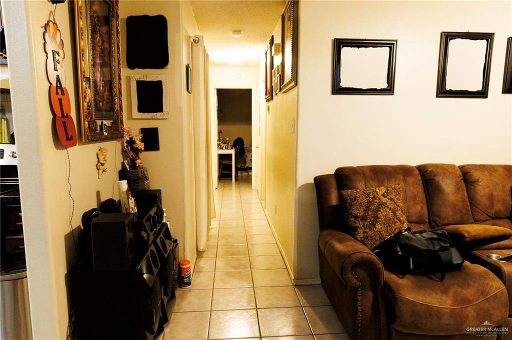 808 West Starr Avenue Pharr, TX 78577 - Photo 3 of 18 Corridor with light tile patterned floors