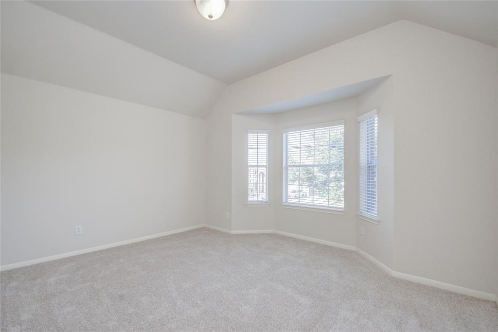 20011 Glen Lake Drive Spring, TX 77388 - Photo 23 of 31 an empty room with a window
