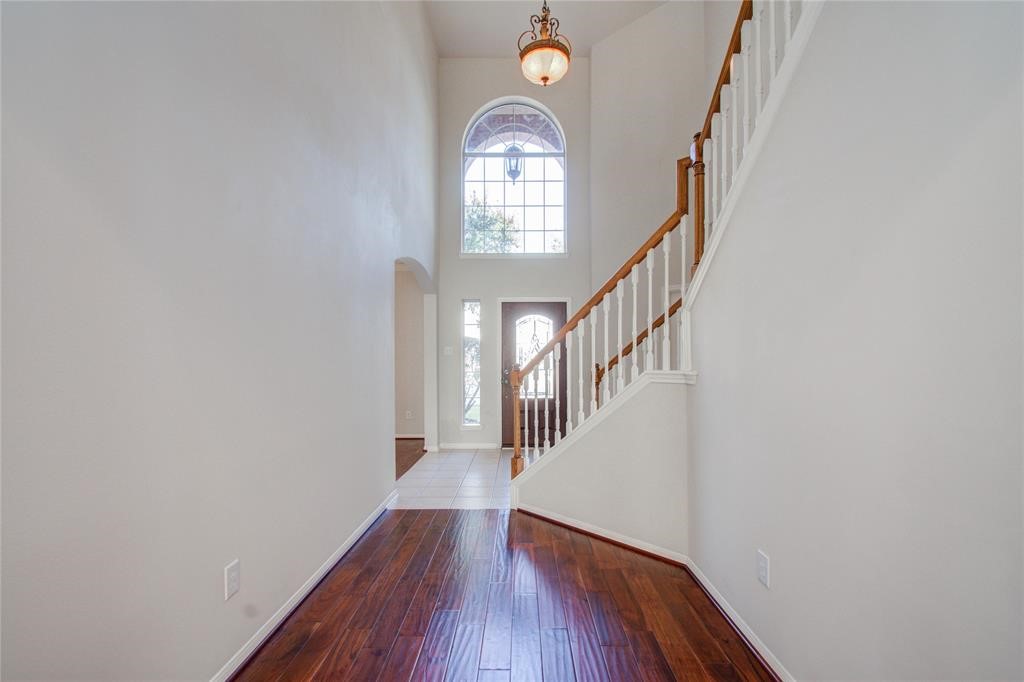 20011 Glen Lake Drive Spring, TX 77388 - Photo 7 of 31 a view of a hallway with wooden floor and entryway