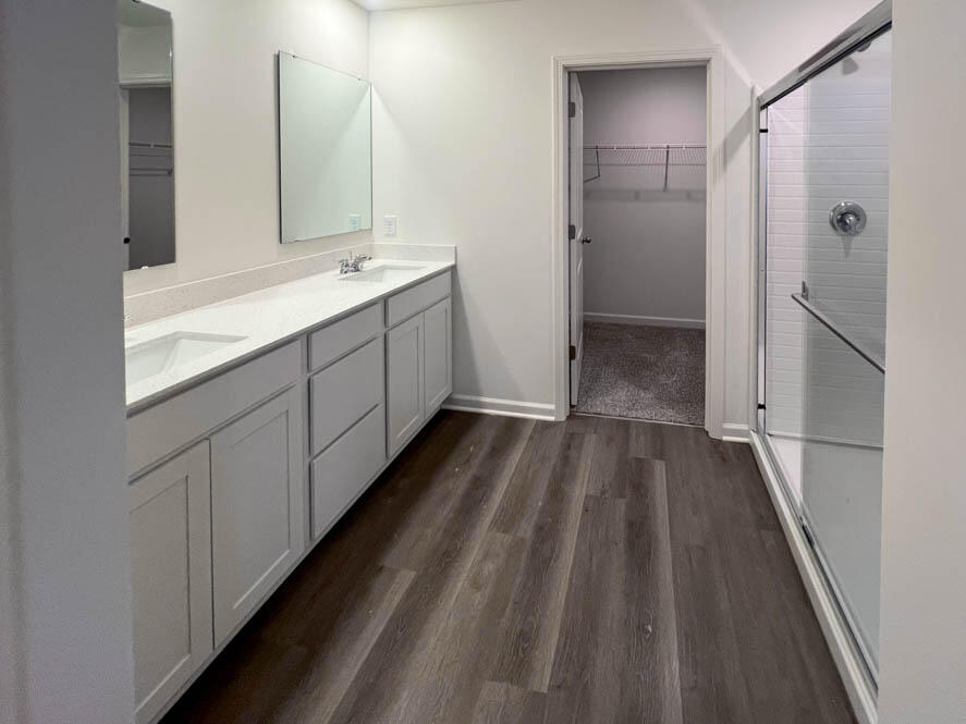 7110 Fair Oaks Road Mount Pleasant, WI 53403 - Photo 6 of 40 Primary bathroom with walk in shower and water closet