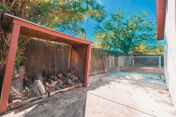 a backyard of a house with lots of green space