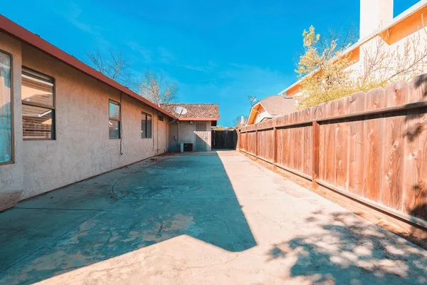 a view of backyard with green space