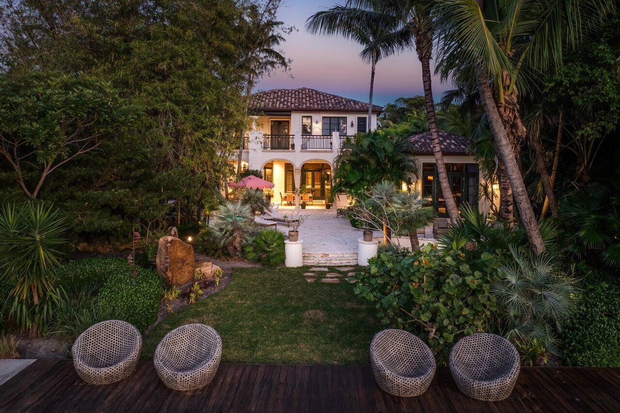 8 Driftwood Landing Road Gulf Stream, FL 33483 - Photo 22 of 67 a front view of house with yard space and outdoor seating