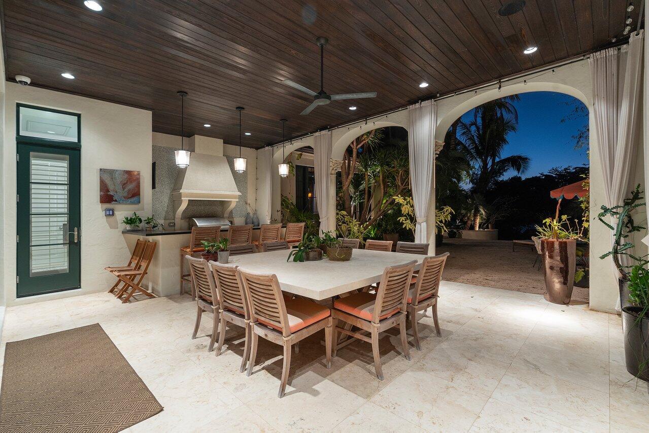 8 Driftwood Landing Road Gulf Stream, FL 33483 - Photo 26 of 67 a view of a dining room with furniture