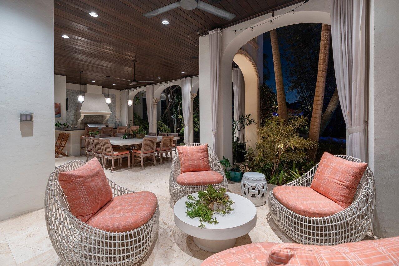 8 Driftwood Landing Road Gulf Stream, FL 33483 - Photo 27 of 67 a outdoor living space with furniture and a fireplace