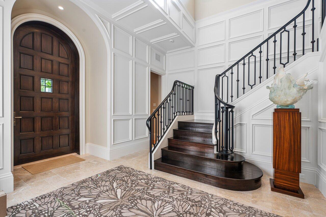 8 Driftwood Landing Road Gulf Stream, FL 33483 - Photo 31 of 67 a view of entryway and hall with wooden floor