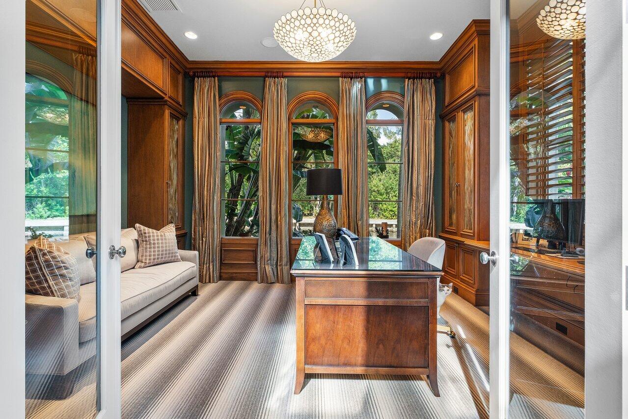 8 Driftwood Landing Road Gulf Stream, FL 33483 - Photo 34 of 67 a living room with furniture and a large window