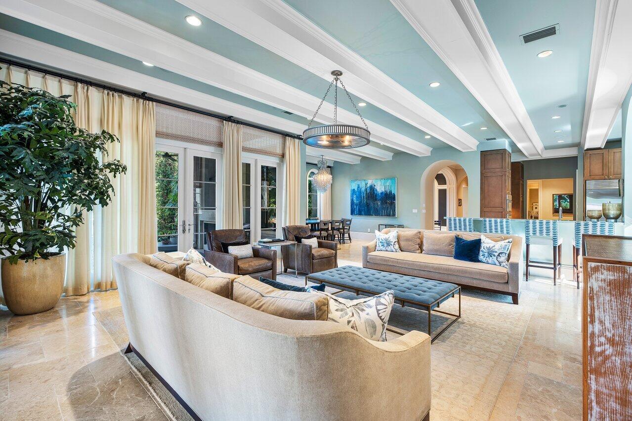 8 Driftwood Landing Road Gulf Stream, FL 33483 - Photo 41 of 67 a living room with furniture and a potted plant