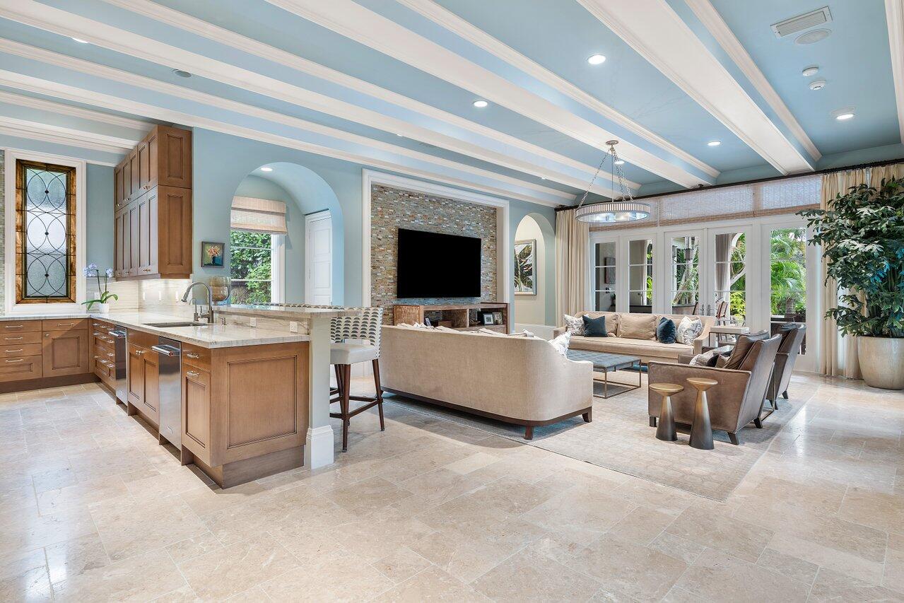 8 Driftwood Landing Road Gulf Stream, FL 33483 - Photo 42 of 67 a living room with furniture and a flat screen tv