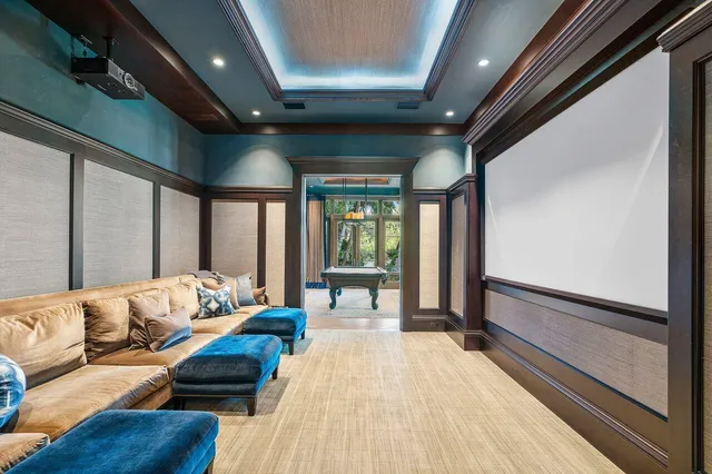 a bedroom with furniture and flat screen tv