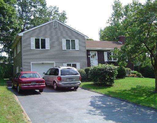 a house view with a garden space