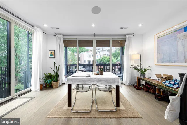 a workspace with furniture and a window