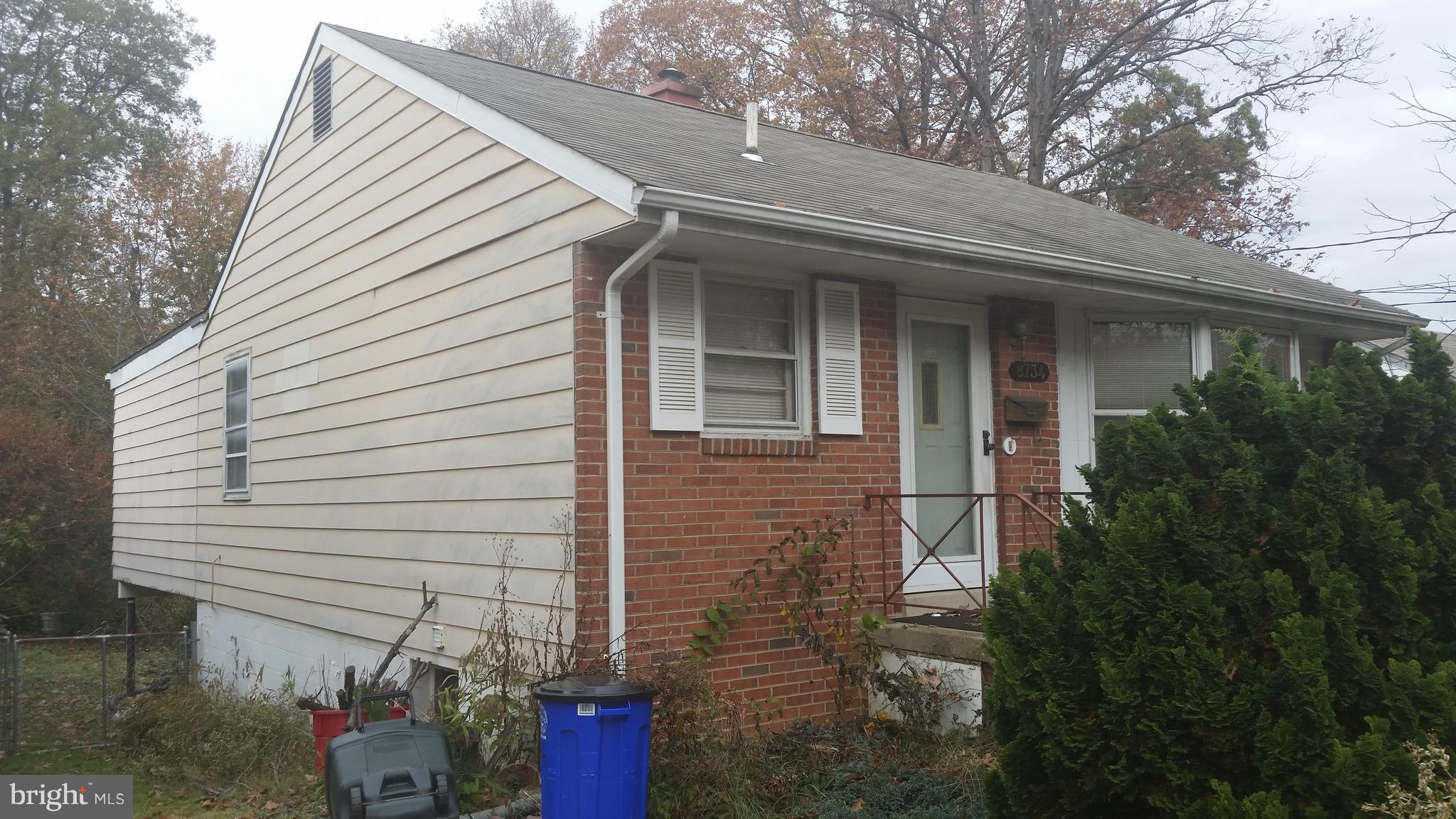 8734 Edmonston Road Berwyn Heights, MD 20740 - Photo 2 of 13 a view of a house with a patio