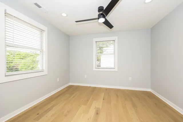 a view of empty room with windows