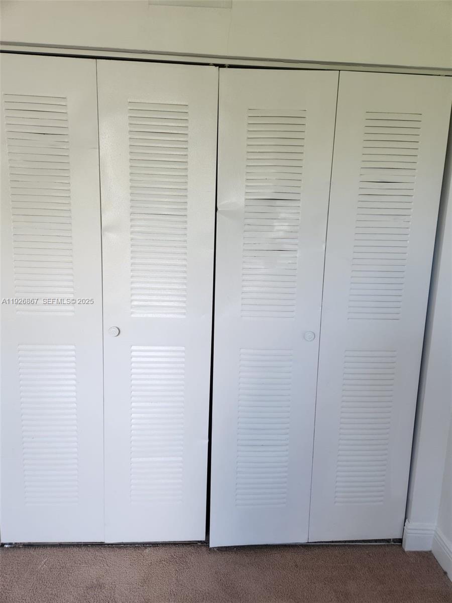 12124 St Andrews Place, Unit 206 Miramar, FL 33025 - Photo 10 of 20 a bathroom with a shower