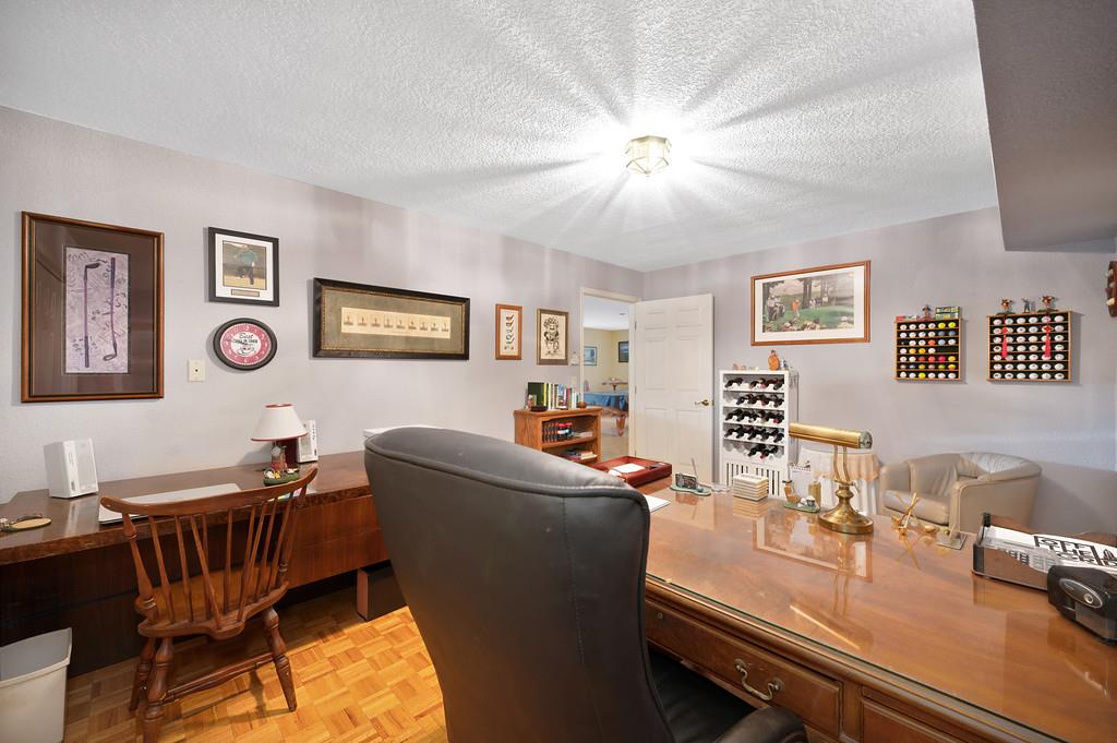 2358 Deer Ravine Court Cool, CA 95614 - Photo 31 of 63 office space featuring a textured ceiling and parquet floors