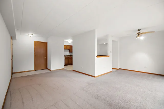 an empty room with a bathroom