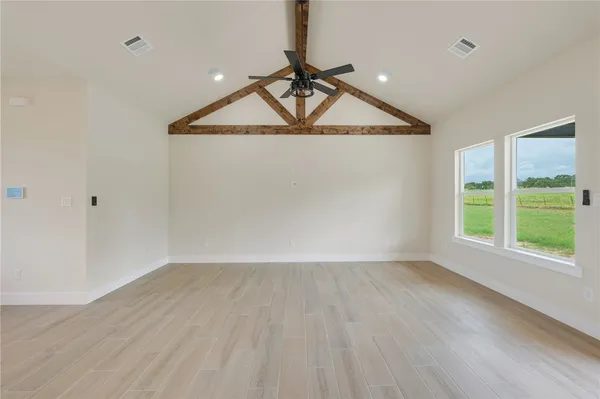 an empty room with windows