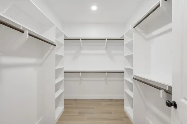 a bathroom with a sink vanity and a mirror