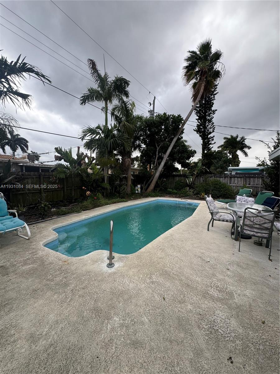 918 Southeast 16th Street, Unit 918 Deerfield Beach, FL 33441 - Photo 11 of 20 a view of outdoor space yard and outdoor kitchen