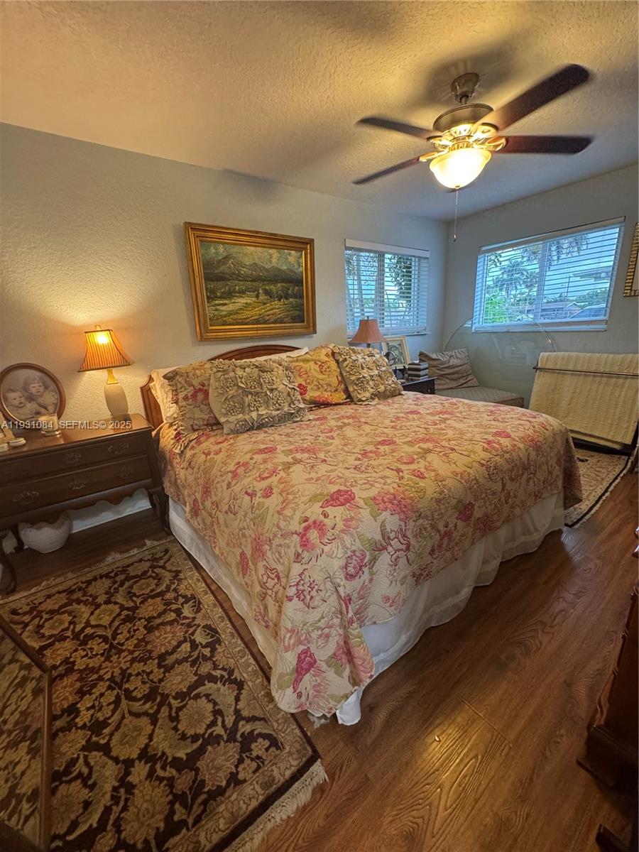 918 Southeast 16th Street, Unit 918 Deerfield Beach, FL 33441 - Photo 17 of 20 a bedroom with bed and window