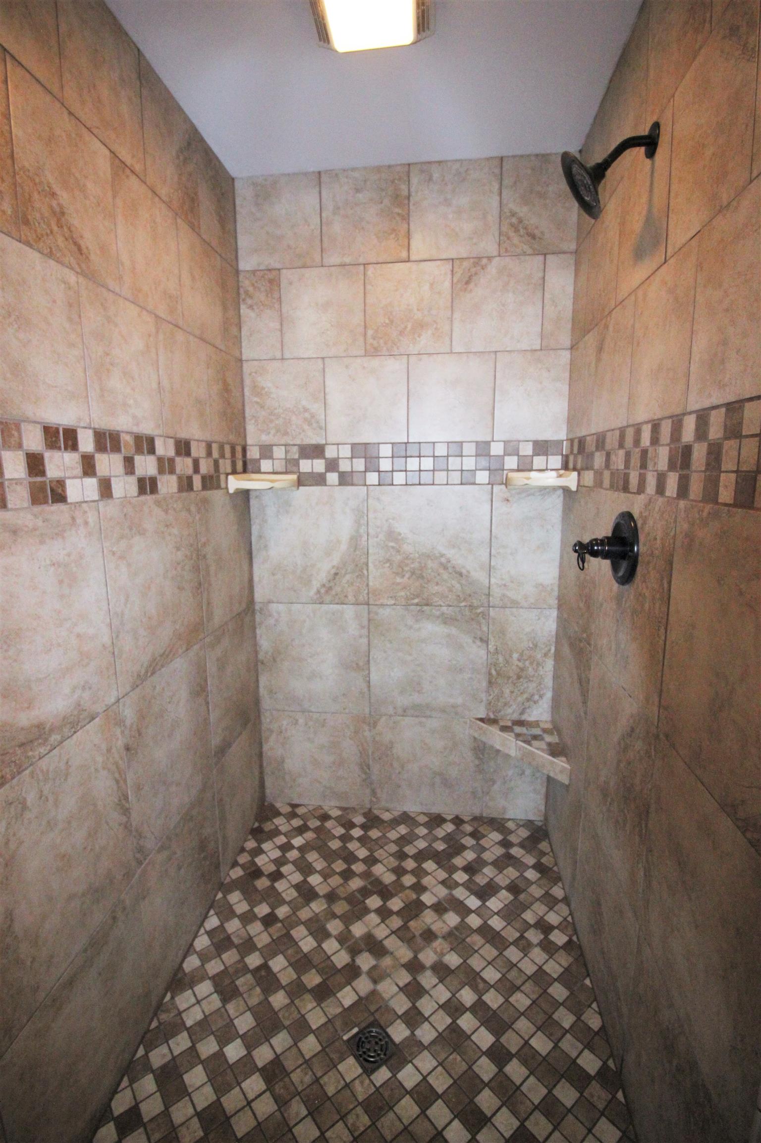 304 Williams Road Manchester, TN 37355 - Photo 12 of 20 a bathroom with a shower