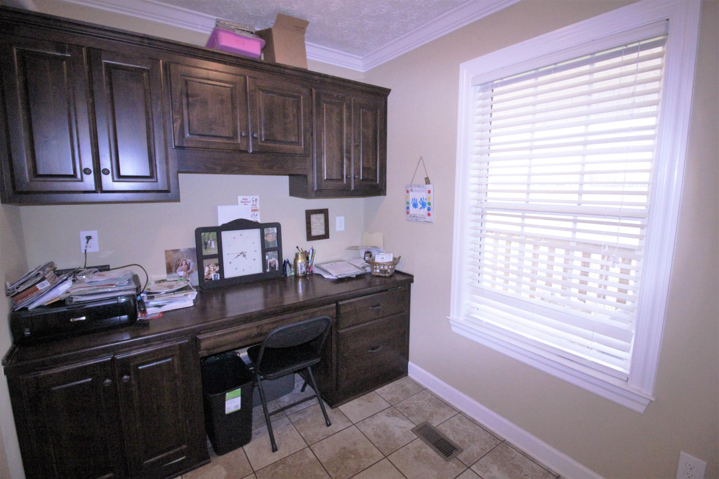 304 Williams Road Manchester, TN 37355 - Photo 16 of 20 a kitchen with a sink cabinets and window