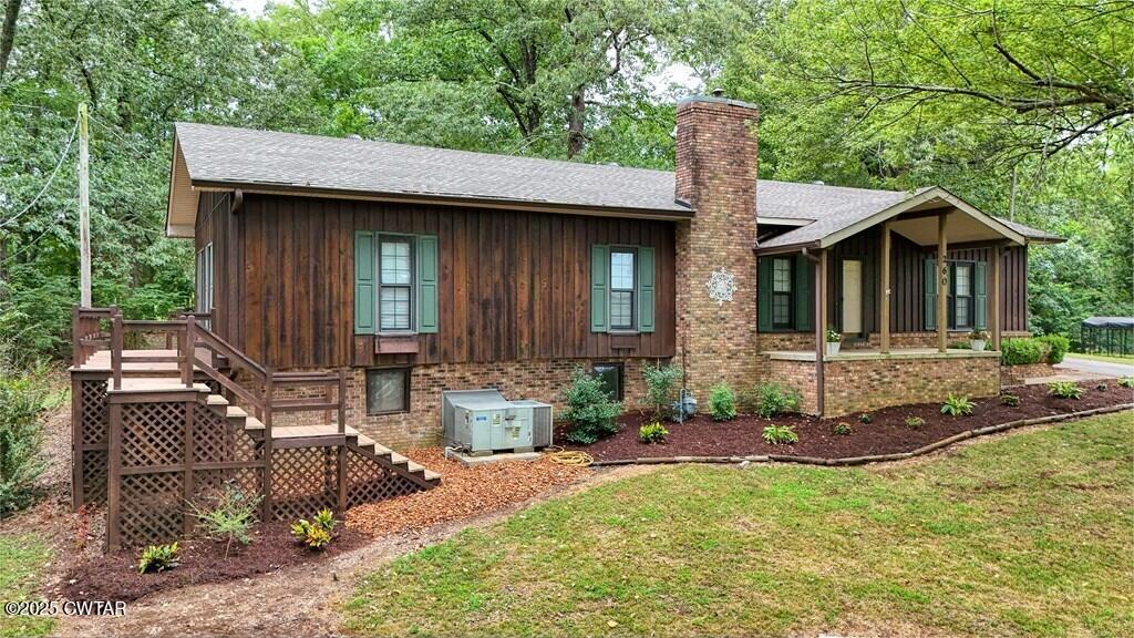 260 Cotham Drive Huntingdon, TN 38344 - Photo 2 of 29 a front view of a house with garden